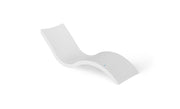 A minimalist, curved white lounge chair with a smooth matte finish, shown from an elevated angle on a clean white background.
